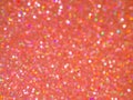 Red Background Glitter Bokeh Light for Celebration,Texture Foil Pink Orange Color,Abstract Wallpaper for Party Holidays Christmas Royalty Free Stock Photo