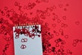 empty notebook between red hearts Royalty Free Stock Photo