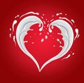 red background with milk splash creating heart shape Royalty Free Stock Photo