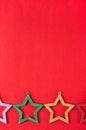 Red background with multicolored star decorations