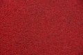 Red bright synthetic texture of foam rubber sponge Royalty Free Stock Photo