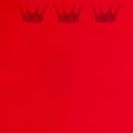 Red background with royal crowns