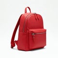 Red backpack isolated on a white background. 3d render image. Royalty Free Stock Photo
