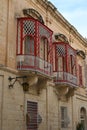 Red balconies on a building in Mdina, Malta Royalty Free Stock Photo