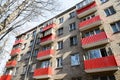 Red balconies on the facade of a residential building Royalty Free Stock Photo