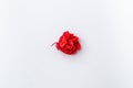 A red ball of crumpled office paper on a white background. Royalty Free Stock Photo