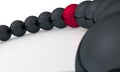 Red ball in row of black ones Royalty Free Stock Photo