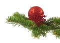 Red ball and red snowflake with branch of Christmas tree isolated on white background Royalty Free Stock Photo