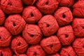 Red Ball of wool. Beautiful colored wools ball. Wool texture. Skeins of yarn. Natural material for knitting, creative Royalty Free Stock Photo