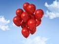 Red balloons on a blue sky Royalty Free Stock Photo