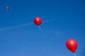 Red balloons on blue sky Royalty Free Stock Photo