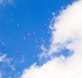 Red balloons with the messages