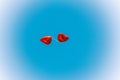 Red balloons in the shape of a heart in the blue sky Royalty Free Stock Photo