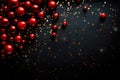 Red balls and gold sequins on a black background. Flat lay background with copy space for black Friday Royalty Free Stock Photo