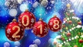 Red balls with numbers 2018 hanging on the background of a blue bokeh and a rotating Christmas tree Royalty Free Stock Photo