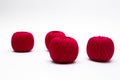 red balls of thread on white background Royalty Free Stock Photo