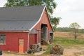 Red barn in barnyard Royalty Free Stock Photo