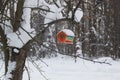 Red Barn Birdhouse Snow Covered In Winter Forest