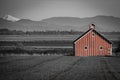 Red Barn with Black and White landscape Mountain Views on Fern Ridge Reservoir