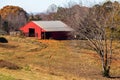 Red barn in Cherokee County Georgia at the end of fall Royalty Free Stock Photo