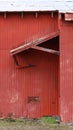 Red barn awning shed old abandoned farm building Royalty Free Stock Photo