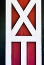 Red barn door with white trime Royalty Free Stock Photo