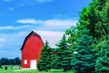 Red Barn on farm in Rural Countryside of American midwest Royalty Free Stock Photo