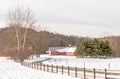 Red barn and farm scenic in winter snow Royalty Free Stock Photo