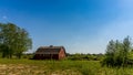 Red Barn in a Farmer's Field Royalty Free Stock Photo