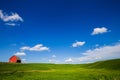 Red barn and green field Royalty Free Stock Photo