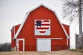 Red Barn with Heart Shaped Patriotic Quilt Royalty Free Stock Photo