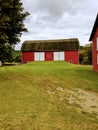 Red barn on small hill Royalty Free Stock Photo