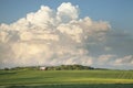 Red Barn and Soybean Fields Below Dramatic Cloudscape