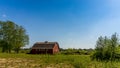 Red Barn under clear Bue Skies Royalty Free Stock Photo