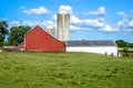 Red Barn, White Outbuilding and Two Silos