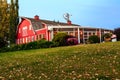 A red barn with a windmill on top Royalty Free Stock Photo