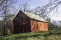 Red barn in woods Royalty Free Stock Photo