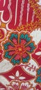 Red batik material with nice ornament