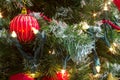 Red bauble christmas tree garland and lights Royalty Free Stock Photo