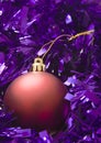 Red Bauble purple tinsel Royalty Free Stock Photo