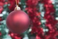 Red bauble and tinsel Royalty Free Stock Photo