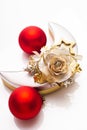 Red baubles and gift box, half-moon-shaped