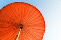 Red beach umbrella with blue sky Royalty Free Stock Photo