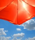 Red Beach Umbrella over blue sky Royalty Free Stock Photo