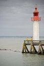 Red beacon with two anglers