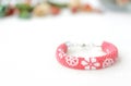 Red beaded bracelet with floral print Royalty Free Stock Photo