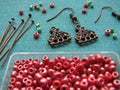 Red beads and pieces for making earrings, handmade jewelry Royalty Free Stock Photo