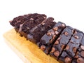 Red bean brownie loaf with chocolate chips slices on wooden cutting board