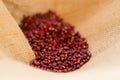 Red bean in linen sack for food ingredient concept. Royalty Free Stock Photo