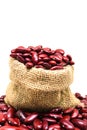 Red bean or red kidney bean in hemp sack isolated on white background. red beans are beneficial support heart health, cholesterol